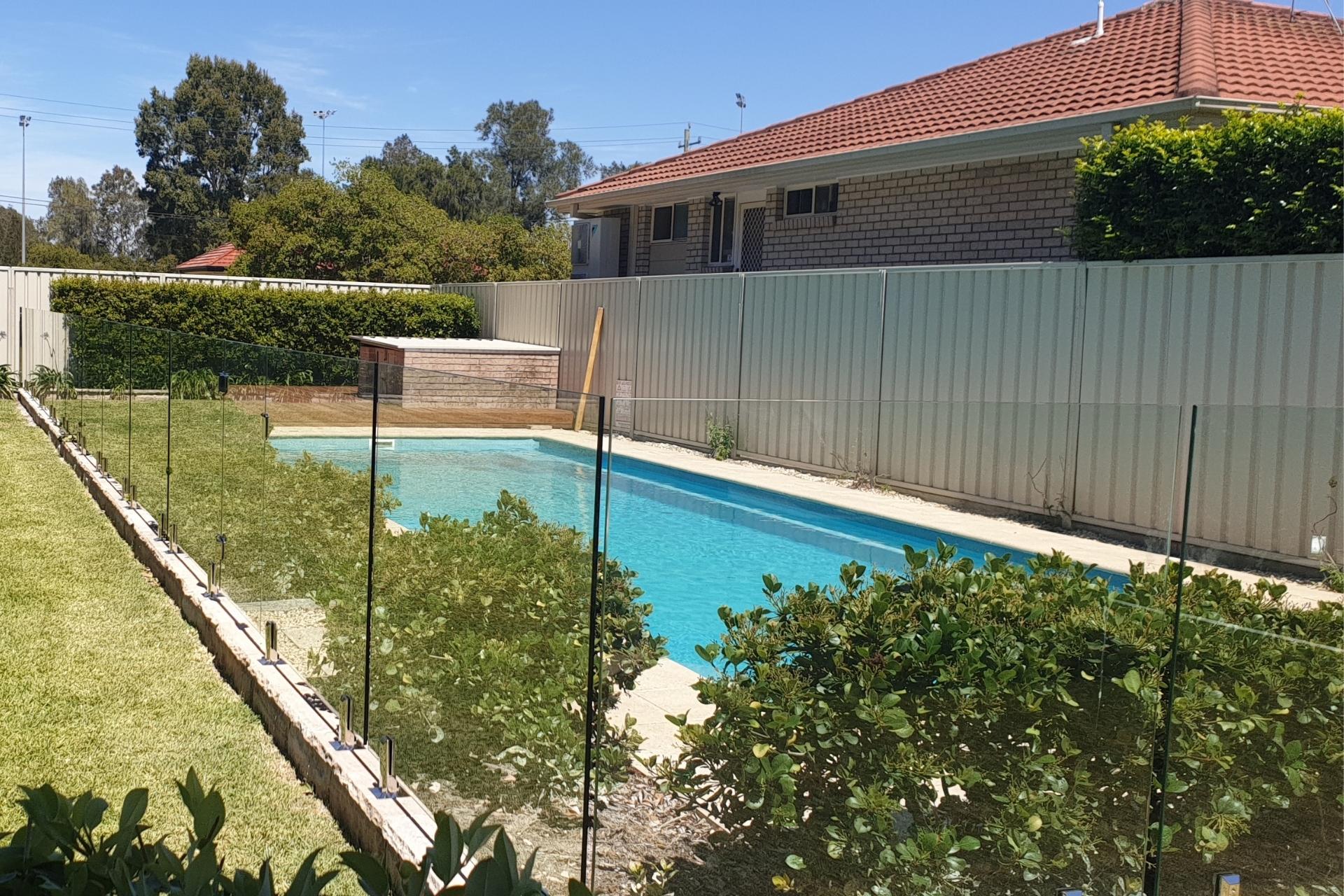 Complete modern pool fencing | Glass Panels with stainless steel fixtures | residential and commercial