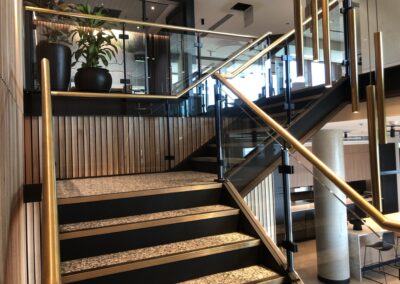 Glencore HQ | Brass handrails glass balustrades | Contemporary Stainless Solutions